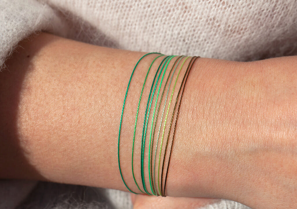 Le fil RedLine Citron vert - le fil RedLine vert Forêt - le fil RedLine Vert Fluo - le fil RedLine vert Emeraude - le fil RedLine vert Kaki Chaud - le fil RedLine vert Kaki - le fil RedLine vert Jade - le fil RedLine vert Olive - le fil RedLine vert Pomme